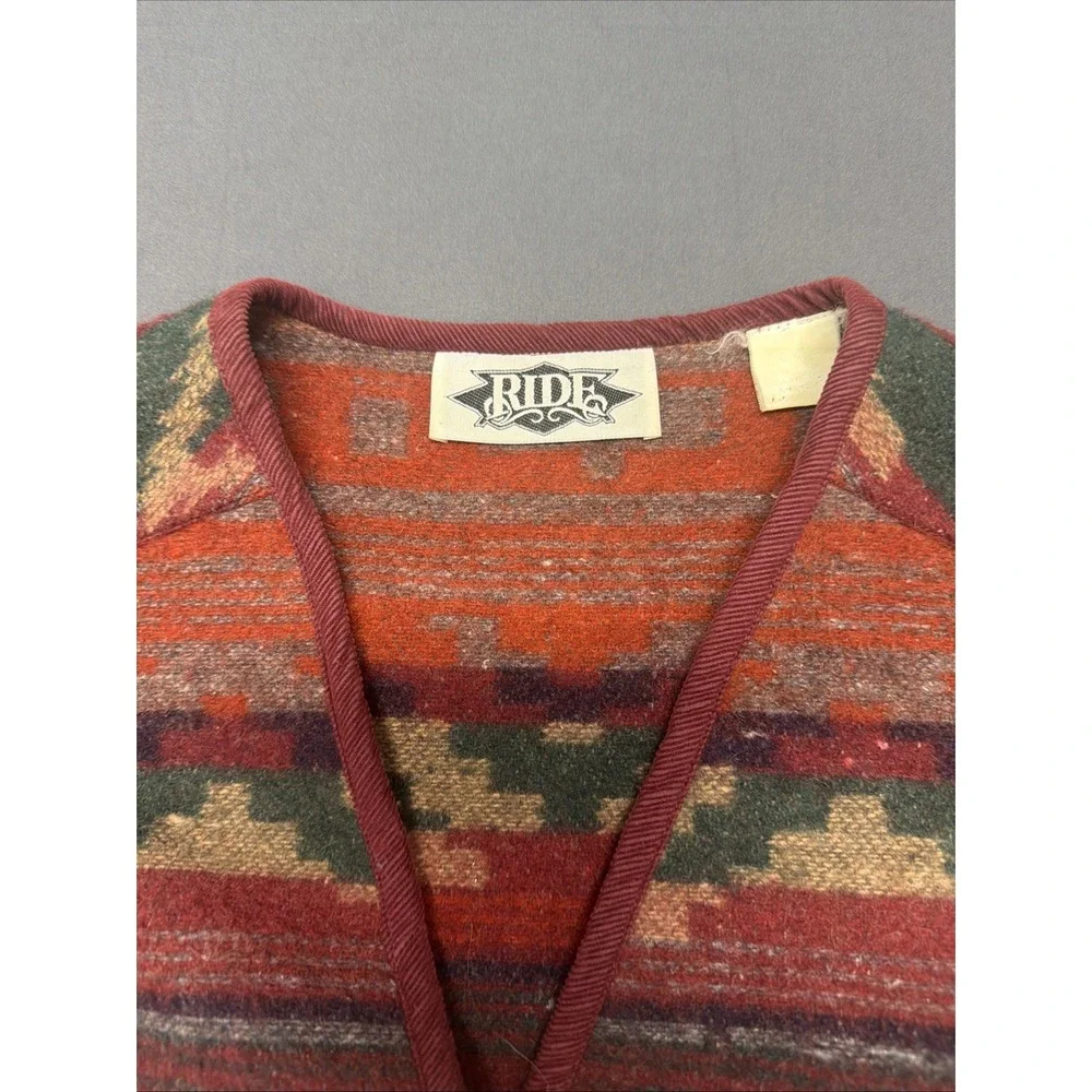 Ride brand Southwestern-style vest features a vibrant geometric pattern in red L